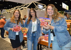 Helen Aquino, Krysten De Giglio and Tiffany Bennett with Village Farms posing in jeans jackets.